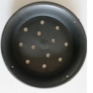 one black plastic saucer pot with holes
