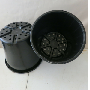 two small black plastic pots