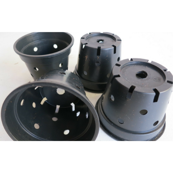 four small black plastic pots